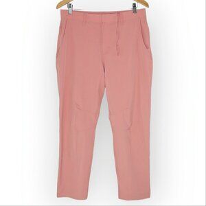 Fabletics The Only Pants Size Medium 32W 27L Slim Water Repellent Gold Office